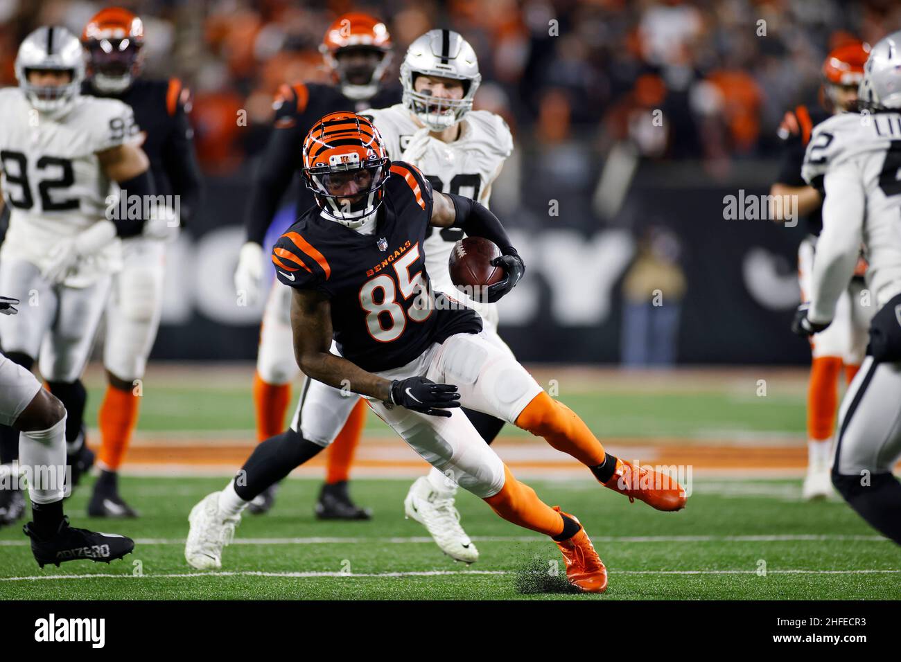 Cincinnati Bengals wide receiver Tee Higgins (85) runs with the ball after  catching a pass during an NFL Wild-Card Playoff football game against the L  Stock Photo - Alamy