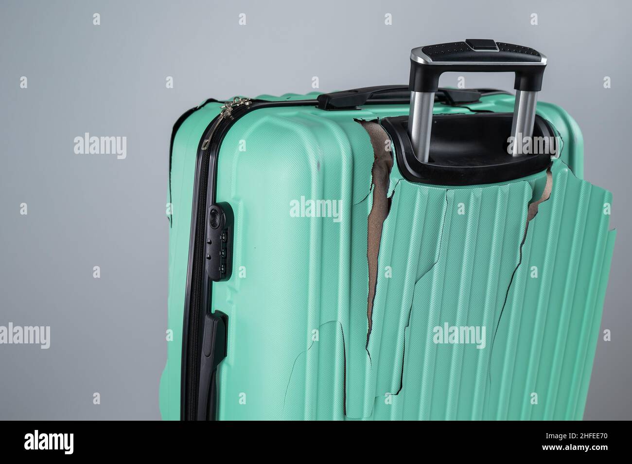 Close-up of a broken plastic suitcase on a white background Stock Photo ...