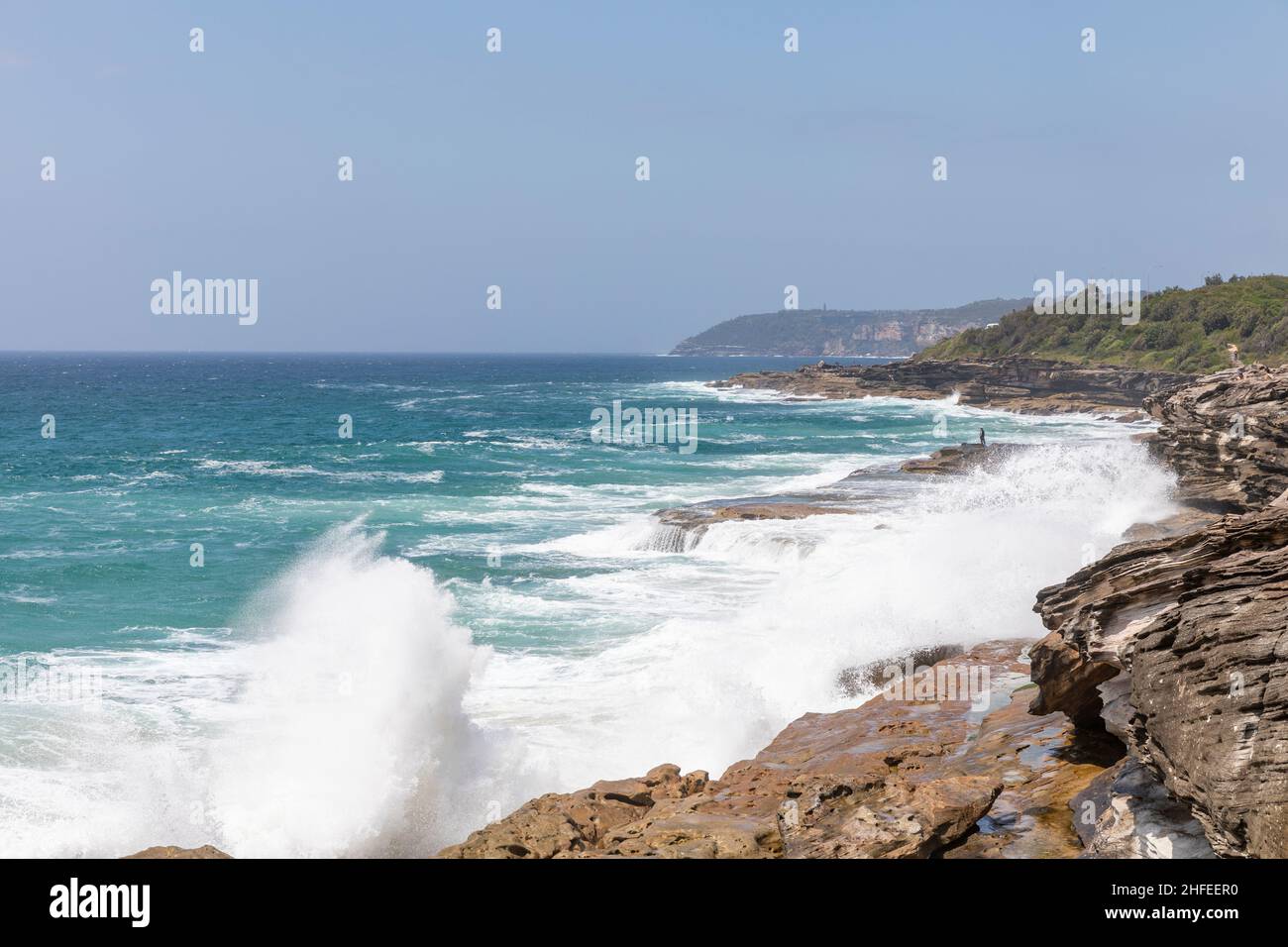 Curl Curl boardwalk renamed Harry Eliffe Way between Curl Curl and Freshwater Sydney gives dramatic coastal views, tsunami warning issued today jan 22 Stock Photo