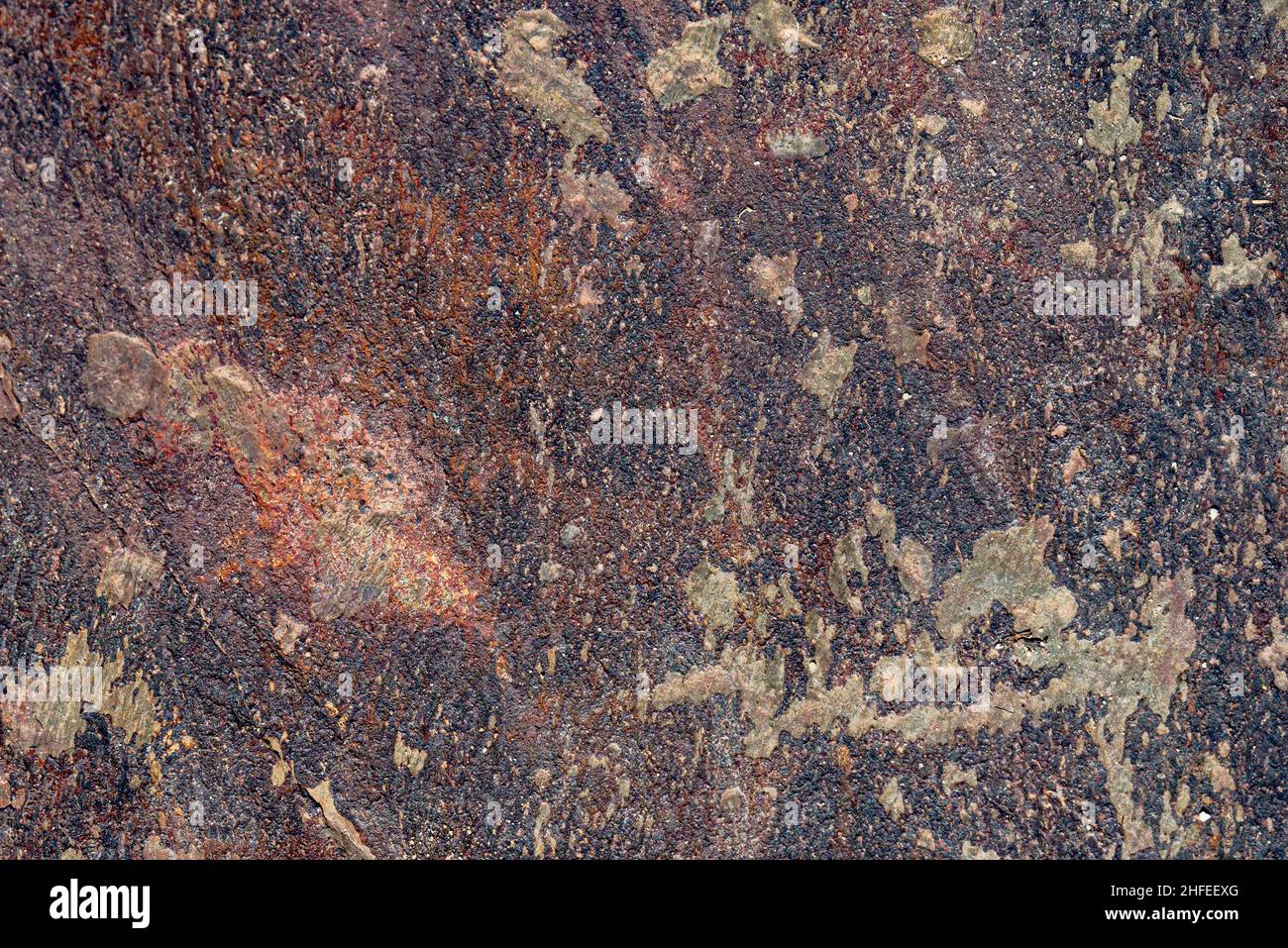 Gneiss the foliated banded metamorphic rock with gneissic texture Stock Photo