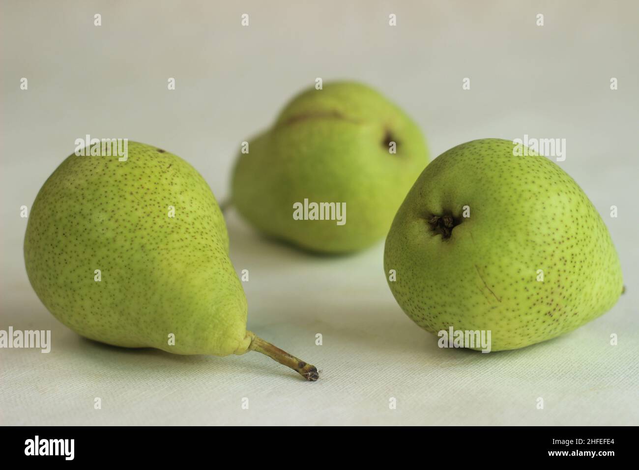 Juicy flavourful green colour pears. isolated shot on whit background Stock Photo