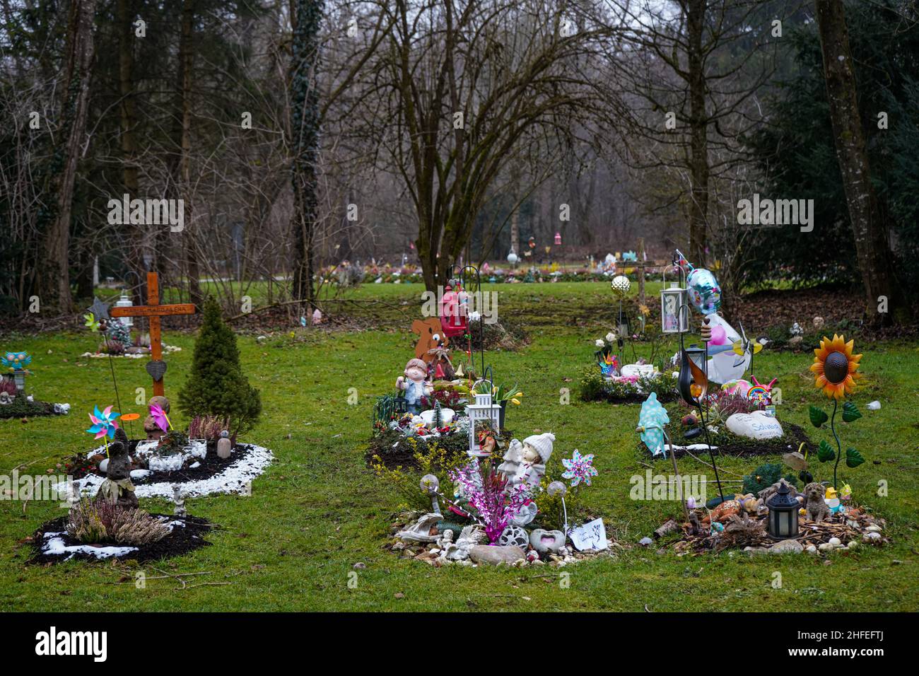 Numerous graves in a cemetery for children and fetuses at the Waldfriedhof cemetery in Munich. Stock Photo