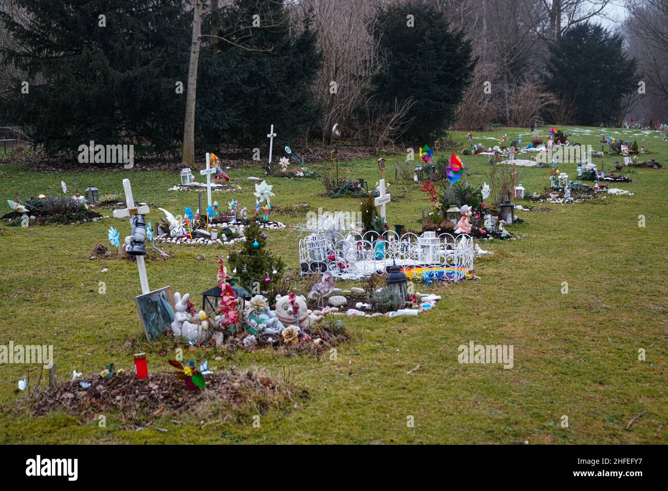 Numerous graves in a cemetery for children and fetuses at the Waldfriedhof cemetery in Munich. Stock Photo