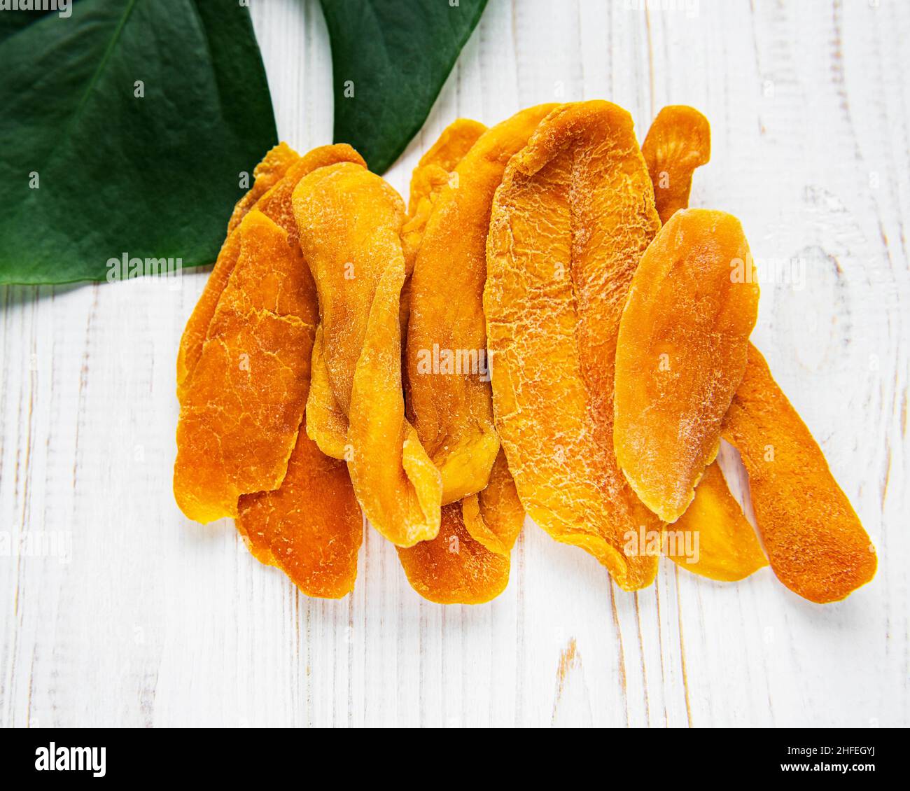 Dried Mango Fruit on Old Wooden Background Stock Photo