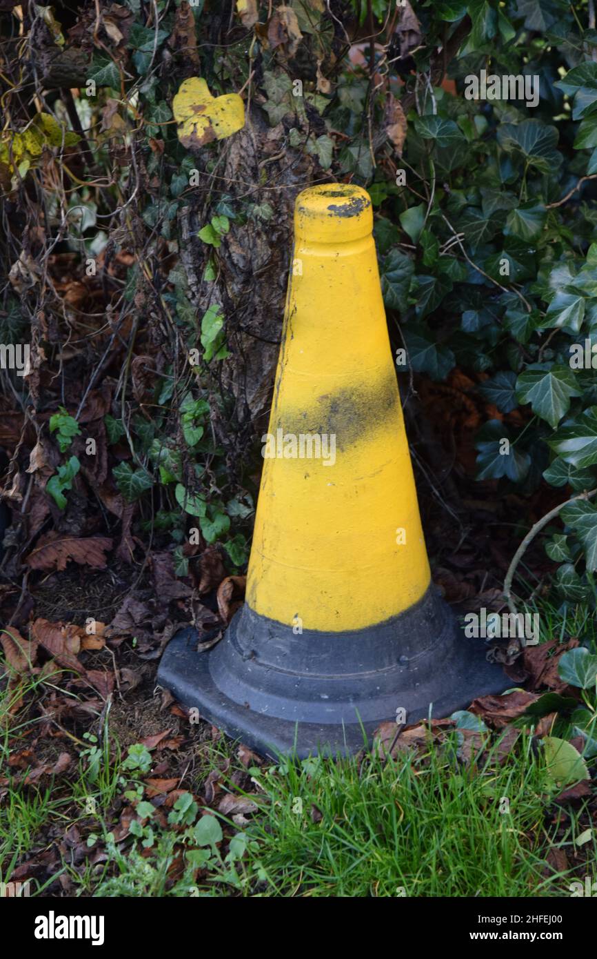 yellow and black, traffic cone, england Stock Photo
