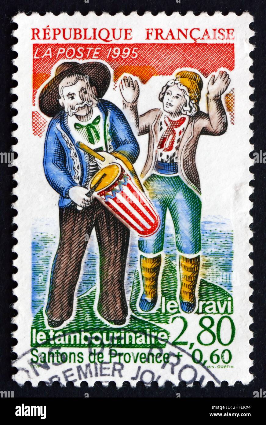 FRANCE - CIRCA 1995: a stamp printed in the France shows The Simpleton and the Tambour Player, Provencal Nativity Figures, circa 1995 Stock Photo