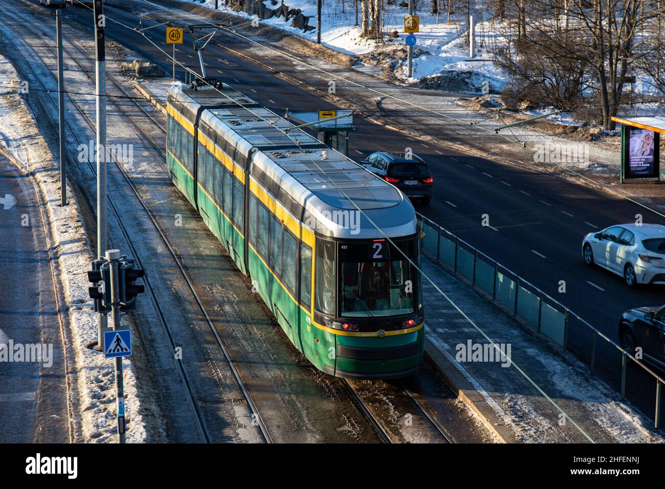High-angle view of tram 437 on line 2 at Auroranportti tram stop on Nrdenskiöldinkatu in Helsinki, Finland Stock Photo