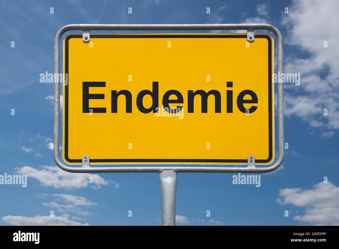 Inscription Endemic (epidemiology) on a traffic sign, place-name sign Germany, beginning of the town Stock Photo