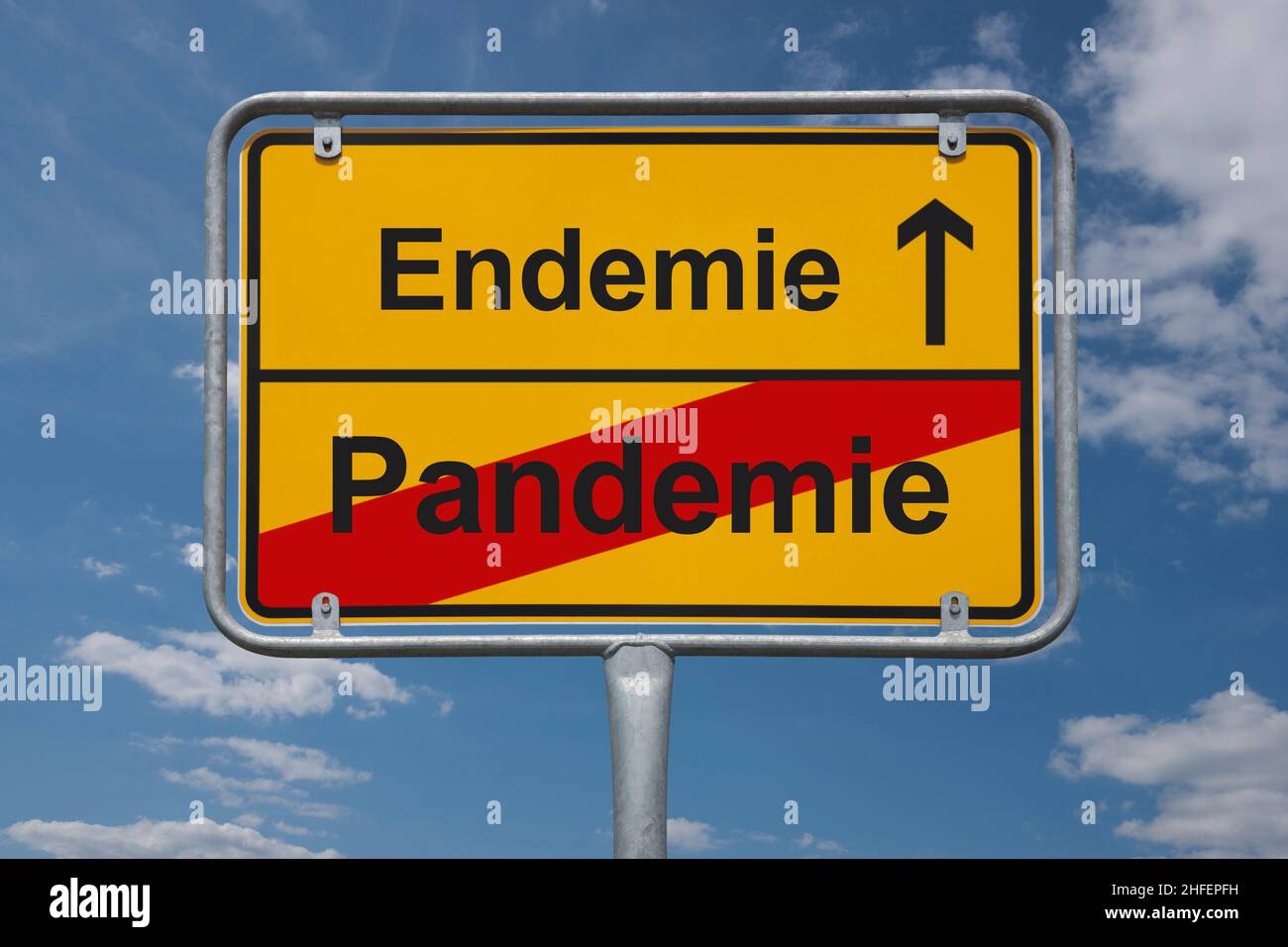 Town sign Germany, End of the town with the inscription end of Pandemic, beginning Endemic Stock Photo