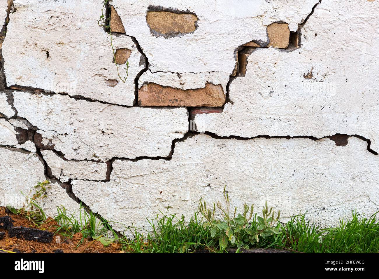 Concrete, weathered, worn, damaged wall paint. Rough, concrete surface