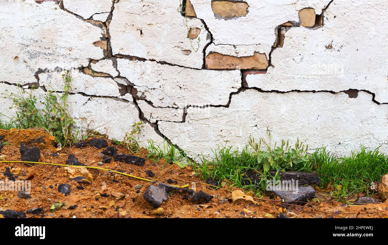 Concrete, weathered, worn, damaged wall paint. Rough, concrete surface