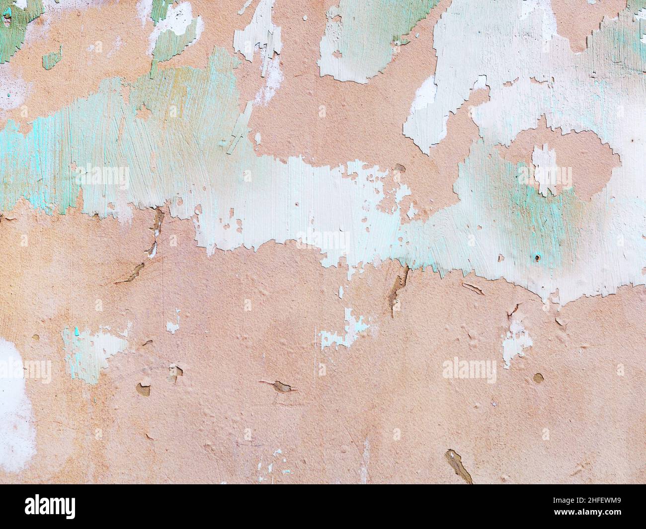 Concrete, weathered, worn, damaged wall paint. Rough, concrete surface