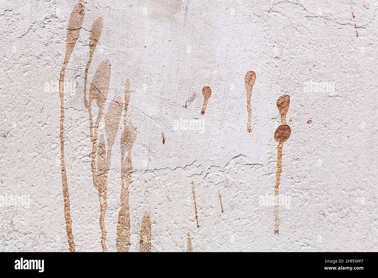 Concrete, weathered, worn, damaged wall paint. Rough, concrete surface