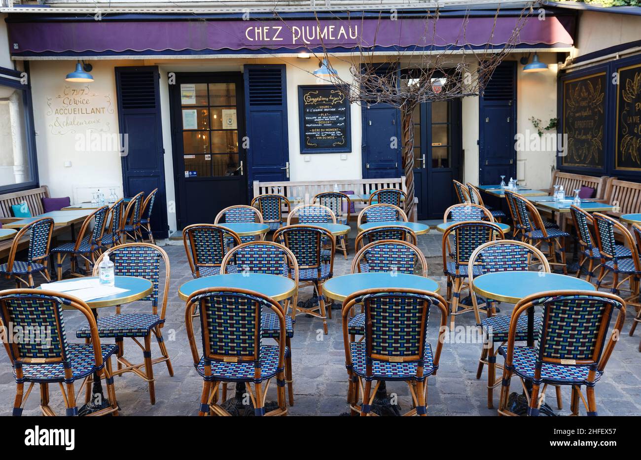 Paris, France-January 15 , 2022 : the traditional French restaurant Chez Plumeau located in Montmartre in 18 district of Paris, France. Stock Photo