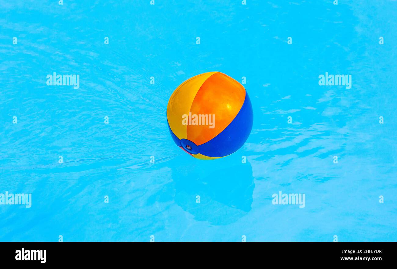 inflated plastic ball in the pool Stock Photo Alamy