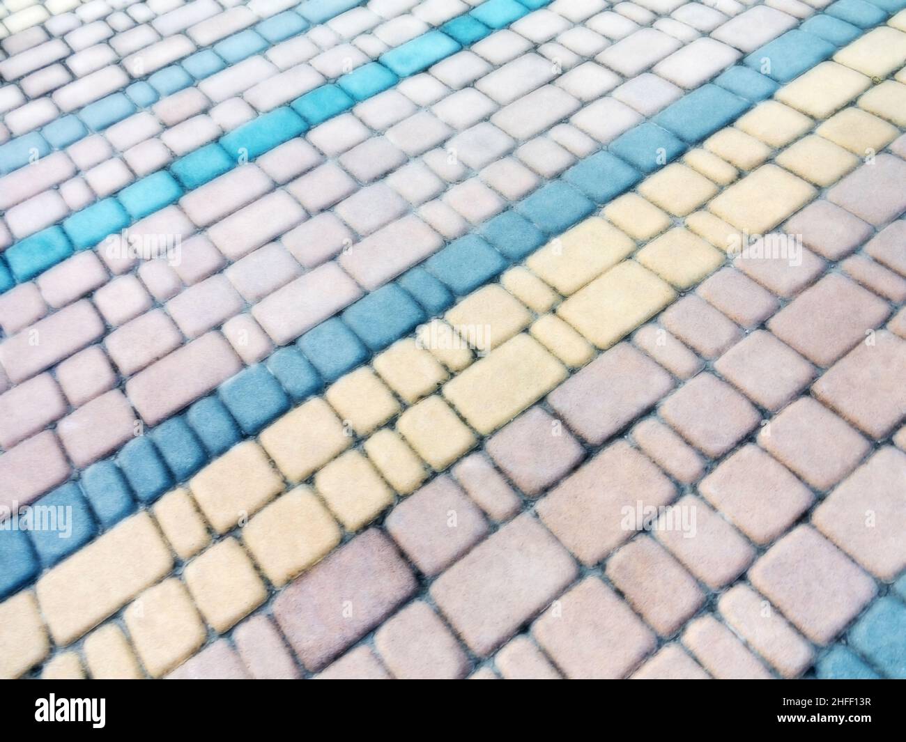 Abstract blurred background decorative paving slabs viewed at a slight angle Stock Photo