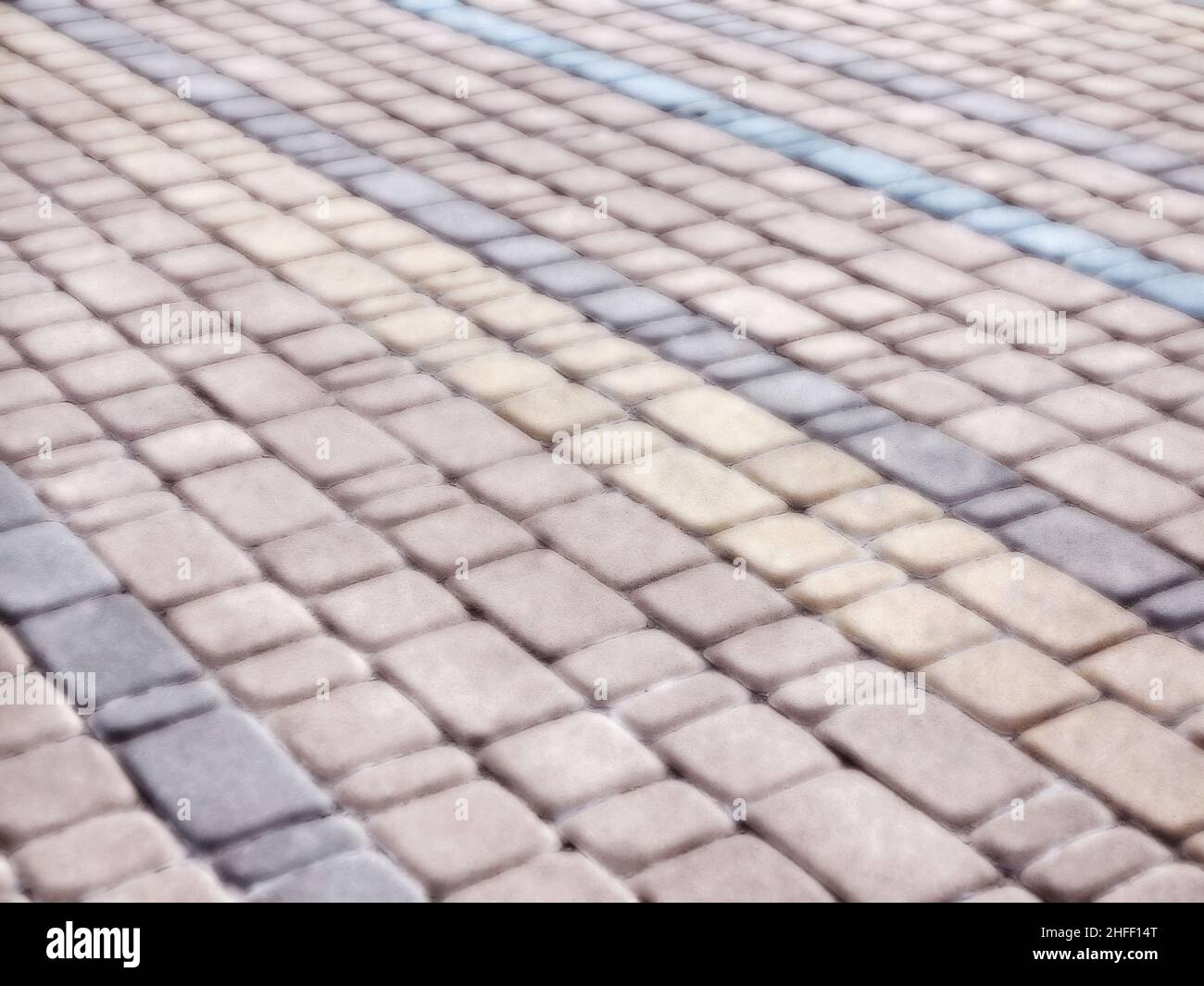 Abstract blurred background decorative paving slabs viewed at a slight angle Stock Photo