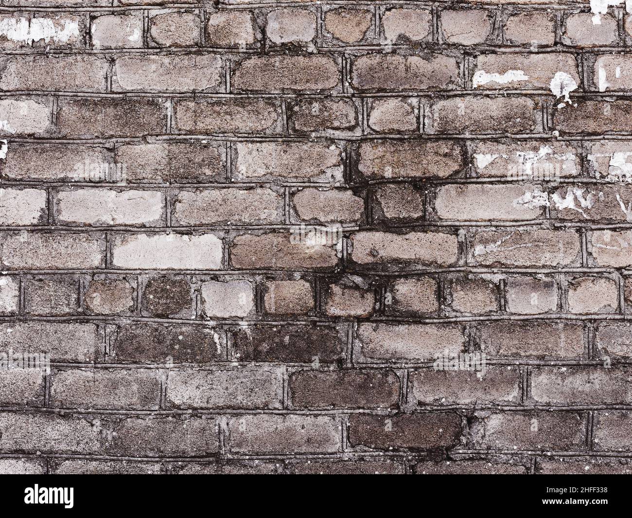 Abstract background old white brick wall with cracks and scratches ...