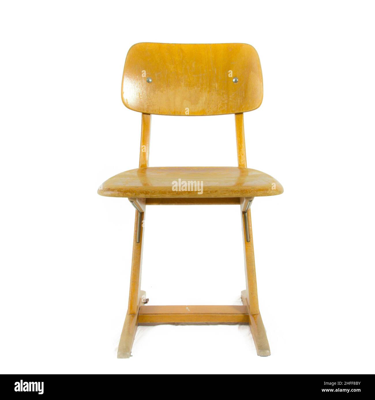 old german used wooden school chair for the young pupils Stock Photo
