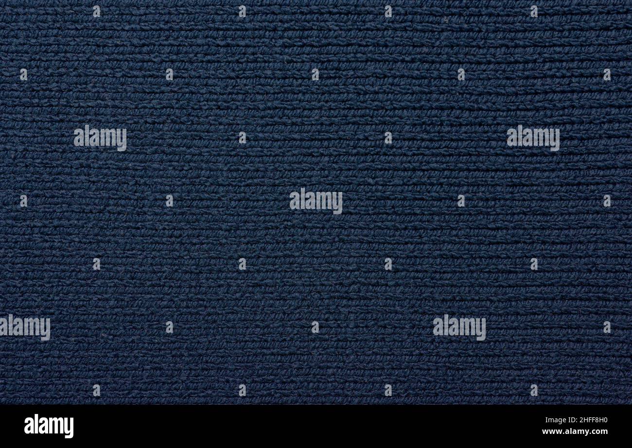Knitted fabric texture. The pattern is clearly visible. Stock Photo