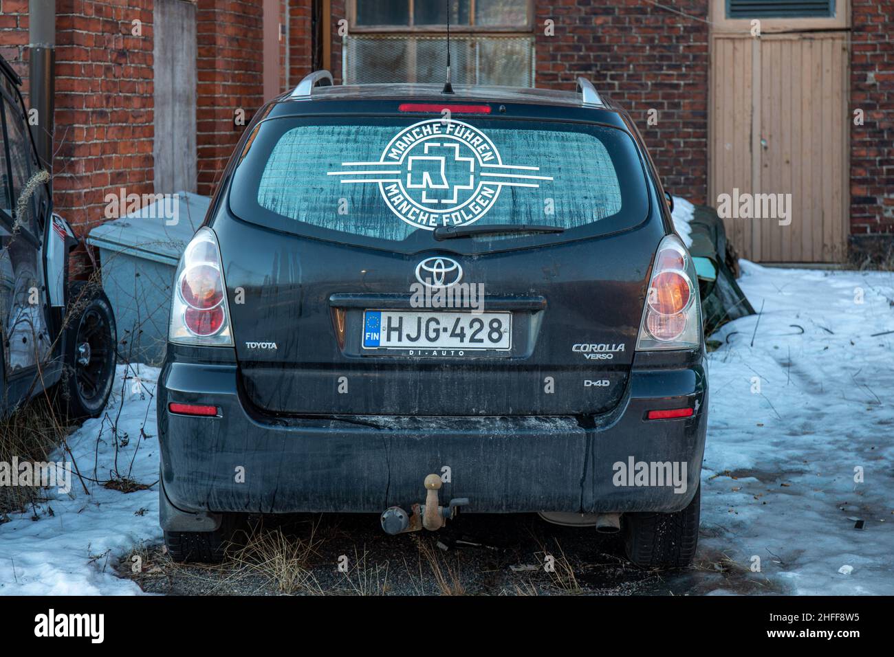 Old Toyota Corolla Verso D-4D with Rammstein sticker on rear window Stock Photo