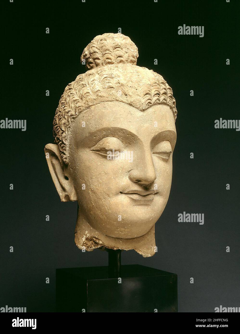 Head of Buddha, 3rd/4th century. Stock Photo