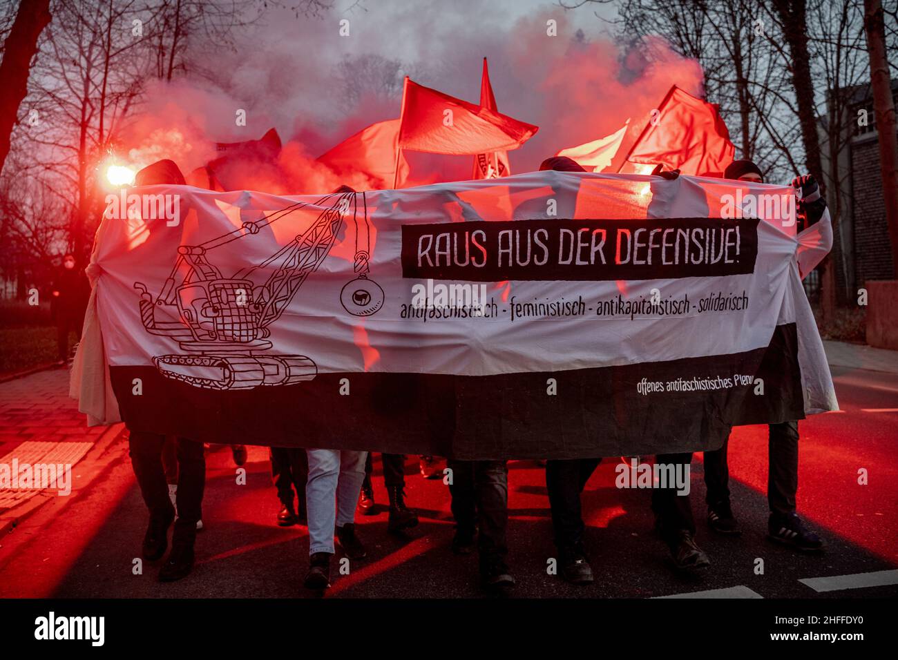 Rosenheim, Germany. 15th Jan, 2022. On January 15, 2022 a few hundreds antifascists gathered in Rosenheim, southern Germany to protest against the AfD bureau of Andreas Winhart and Franz-Xaver Bergmueller. The protestors lit pyrotechnics. (Photo by Alexander Pohl/Sipa USA) Credit: Sipa USA/Alamy Live News Stock Photo