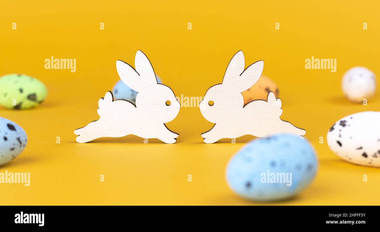 Happy easter greetings with lovely rabbits, banner. Celebration background. Spring holiday concept Stock Photo