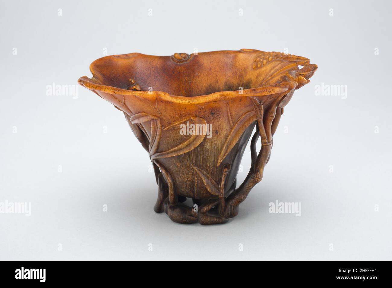 Cup in the Form of an Open Lotus Leaf, with Water Weeds and Grasses Amongst Lotus Buds and Stalks, Late Ming (1368-1644) or early Qing dynasty (1644-1911), 17th/18th century. Stock Photo