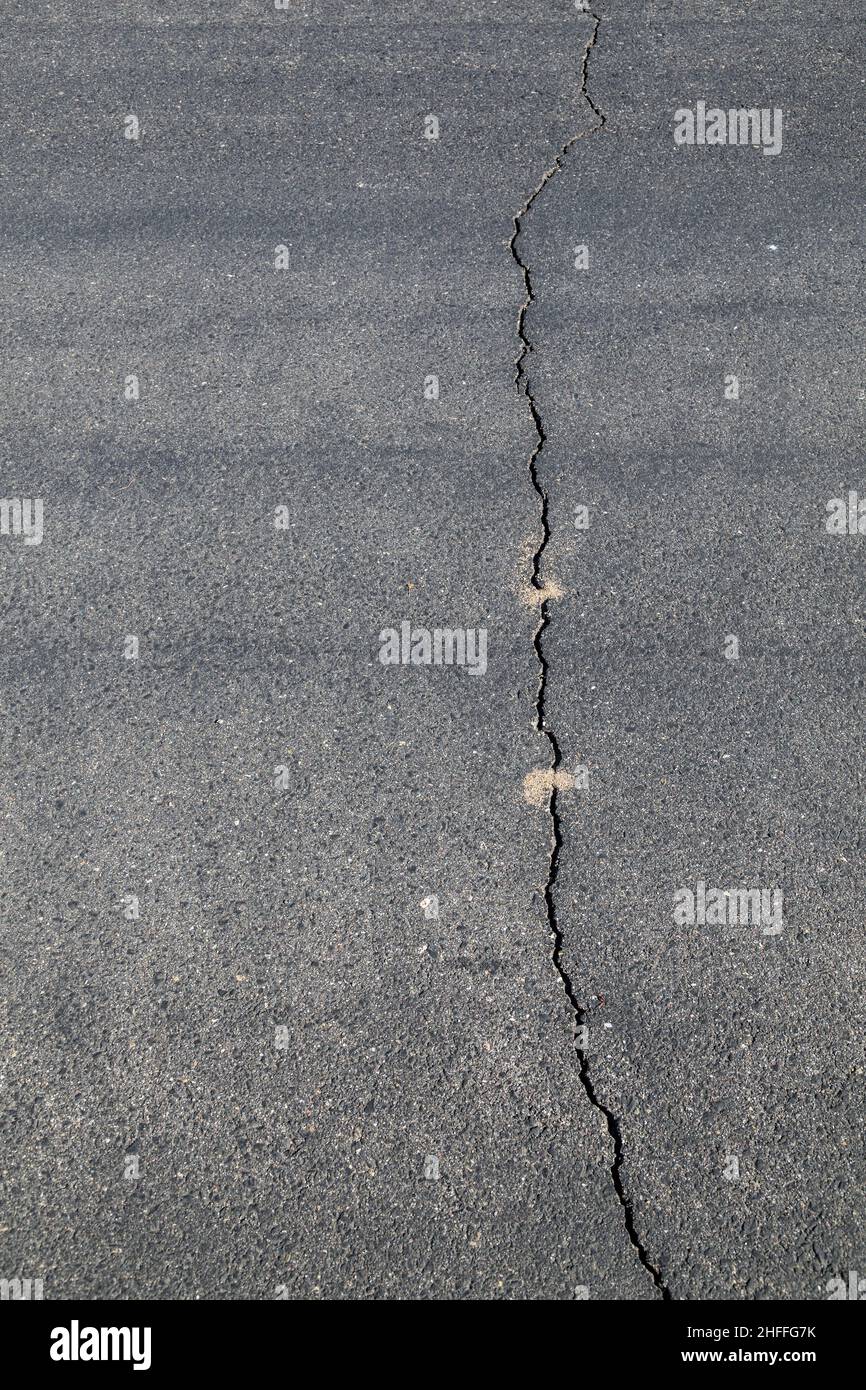 pattern of street in detail with cracked asphalt Stock Photo - Alamy