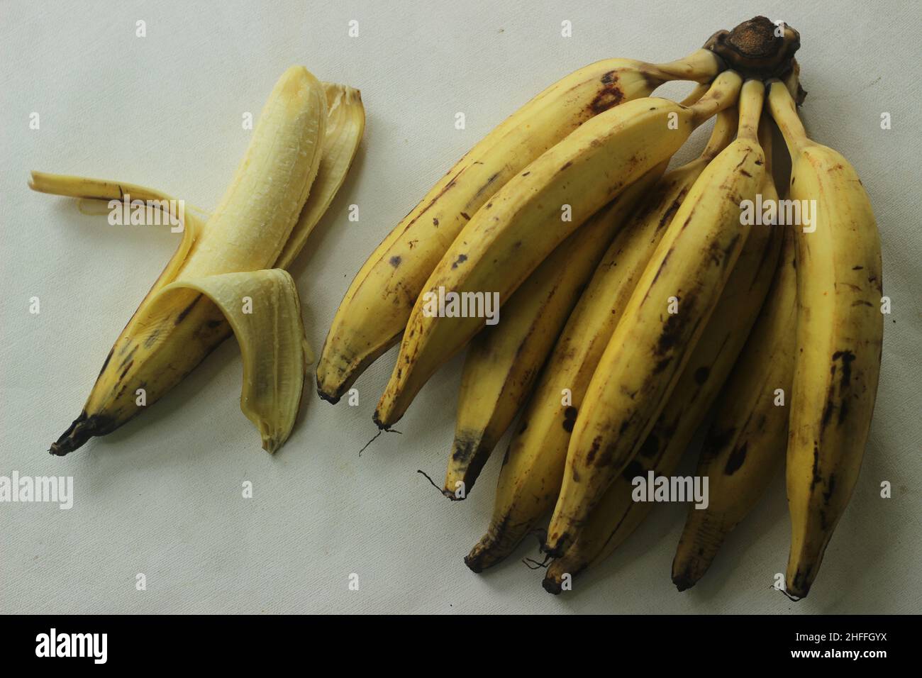 Ripe plantain yellow in colour and thin round plantain slices, ready to eat. Ethakka or plantain is a major banana variety called genus musa that are Stock Photo