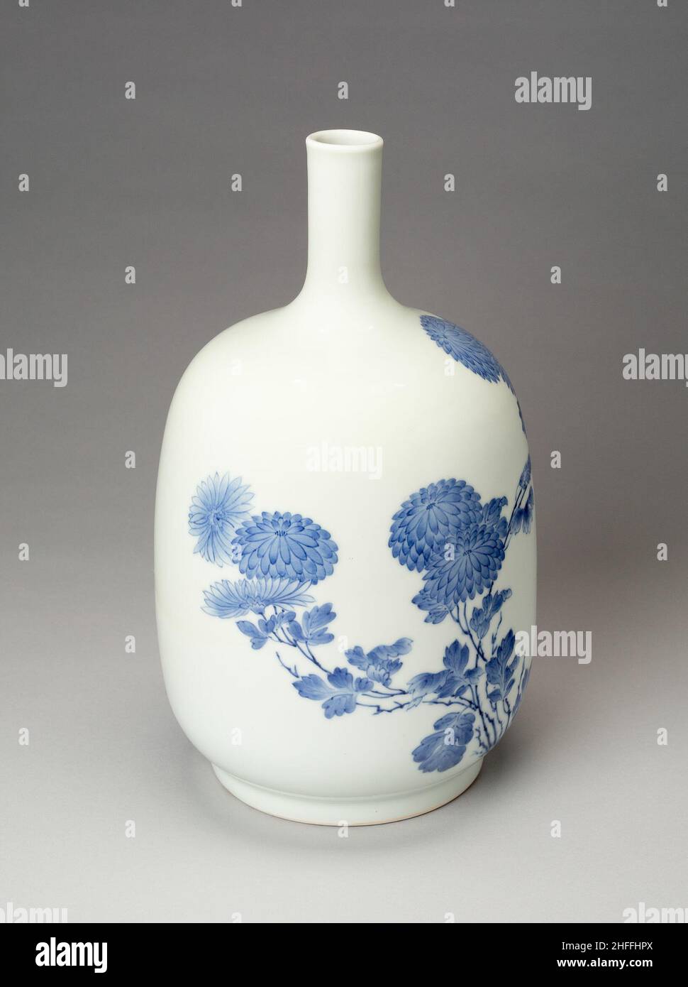 Hirado Ware Sake Bottle with Design of Chrysanthemums, 19th century. Stock Photo