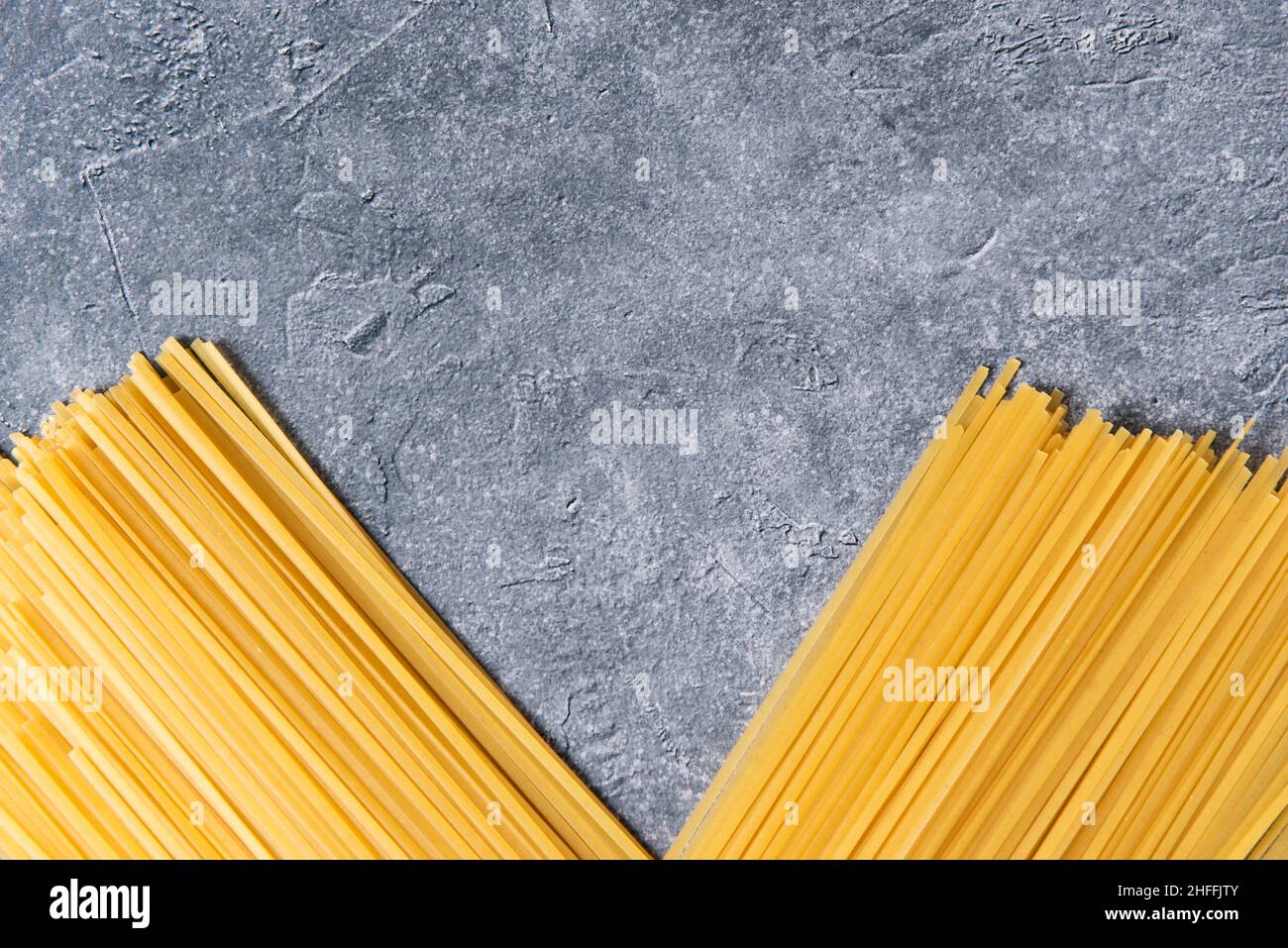 Spaghetti pasta on stone background. Stock Photo