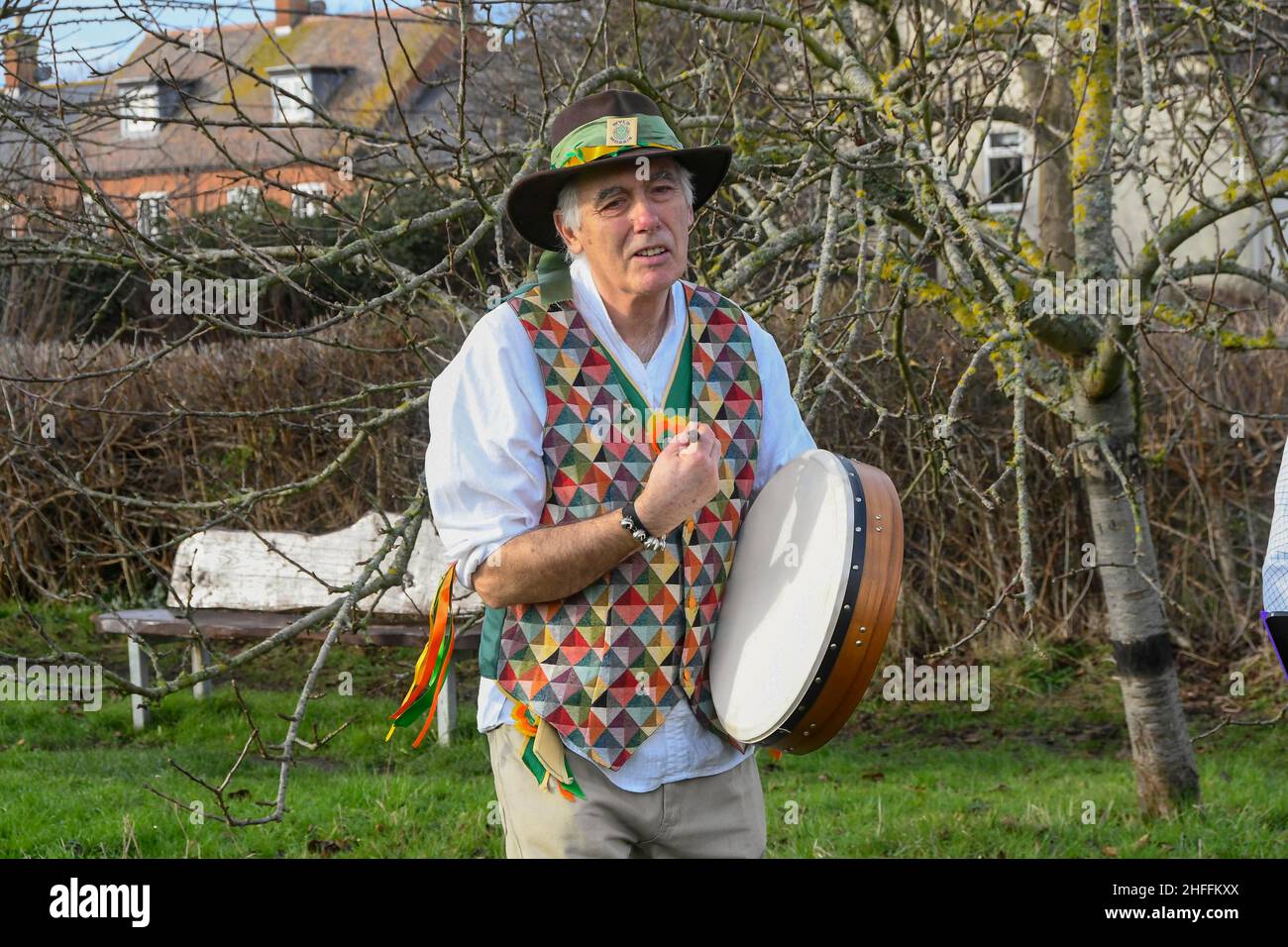 Bridport, Dorset, UK.  16th January 2022.  Wyld Morris performing at the Wassailing at Bridport Community Orchard in Dorset.  Wassailing is a traditional and ancient winter celebration.  Wassail is derived from the the Anglo-Saxon “waes haeil” - to be healthy.  The celebration is used to drive away evil spirits and encourage a good apple crop the following season.  Picture Credit: Graham Hunt/Alamy Live News Stock Photo