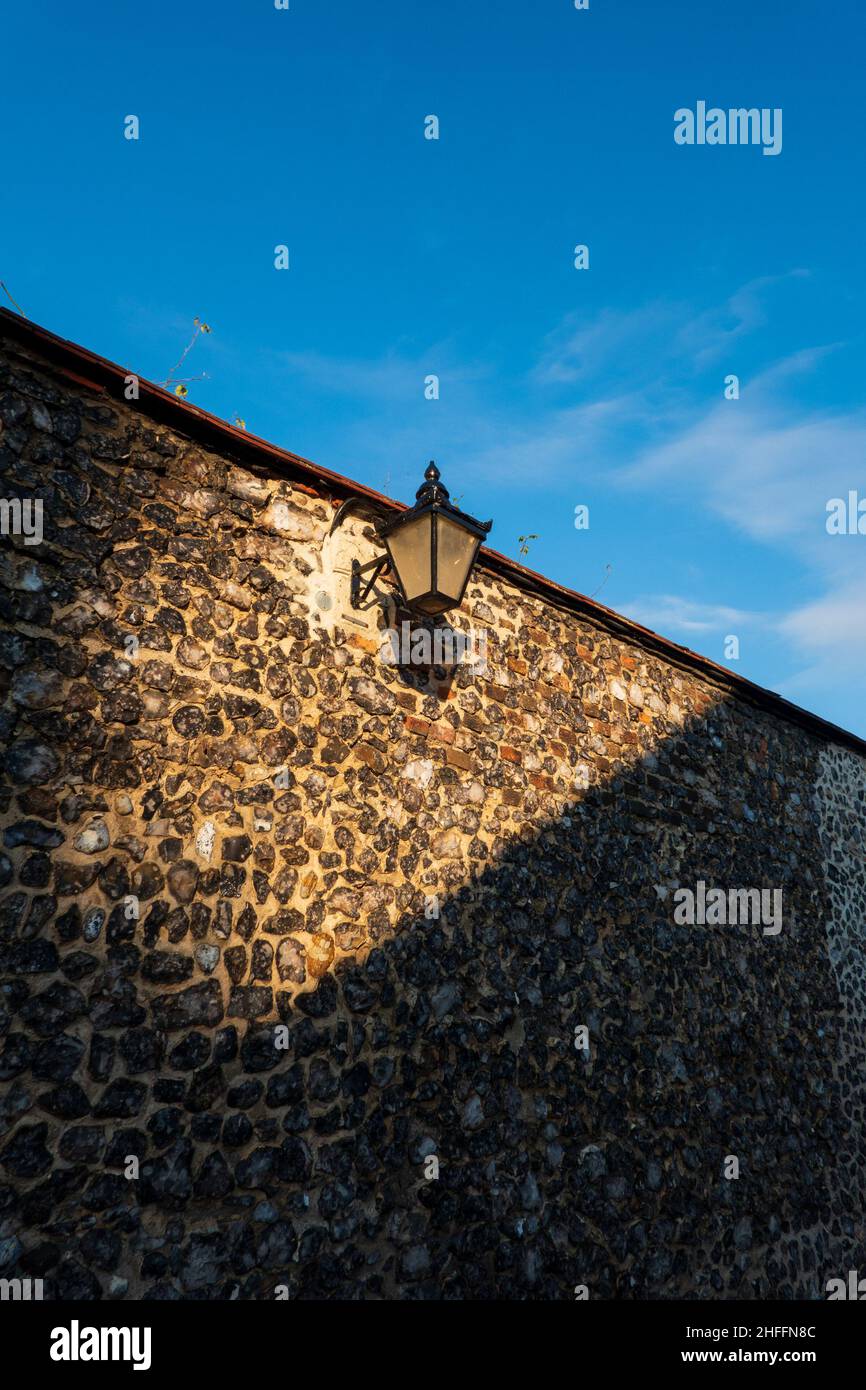 Victoria street light, flint wall Stock Photo Alamy