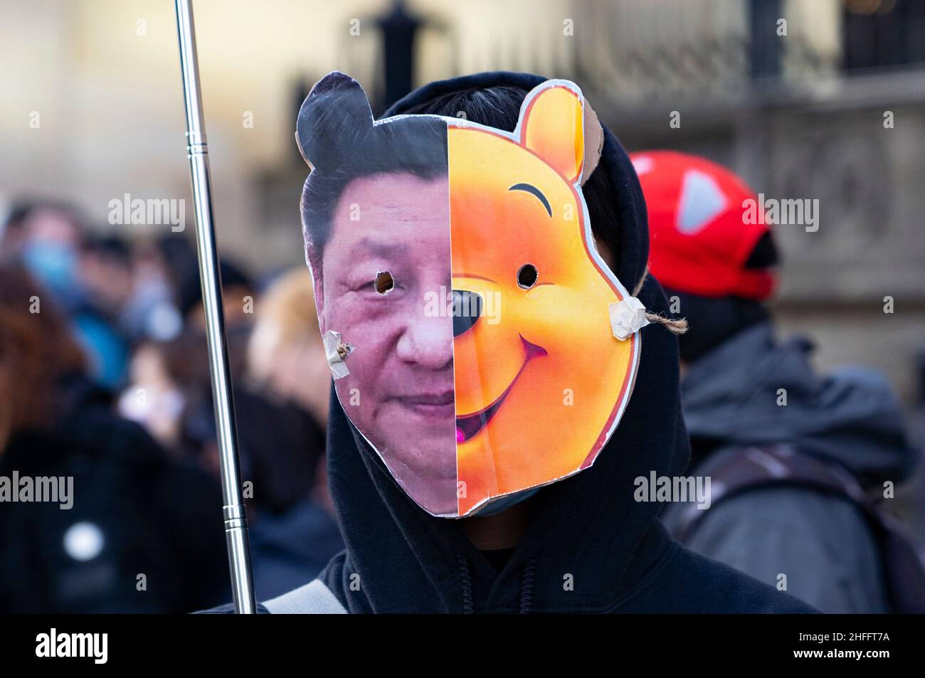 Edinburgh, Scotland, UK. 16th Jan, 2022. Hong Kong people stage pro democracy demonstration on Princes Street in Edinburgh and formed a human chain on adjacent streets. Protesters were demonstrating against the removal of freedoms and democracy under new National Security laws in Hong Kong which severely limits press freedoms. Pic; protester wears a mask with Winnie th poo and Xi jinping. Credit: Iain Masterton/Alamy Live News Stock Photo