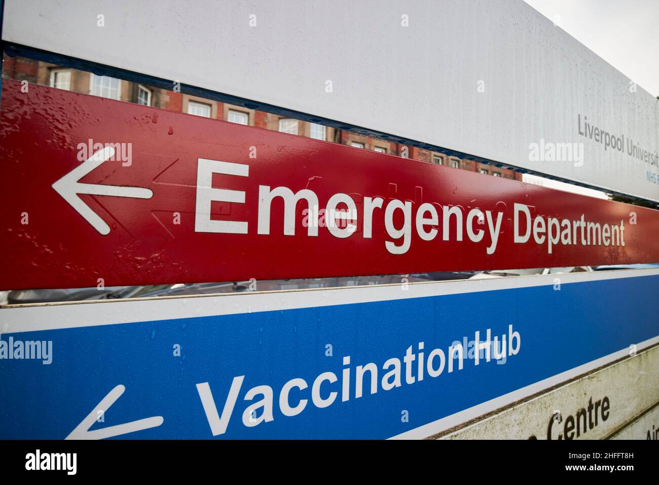 red emergency department directions sign at aintree university hospital fazakerley Liverpool England UK Stock Photo