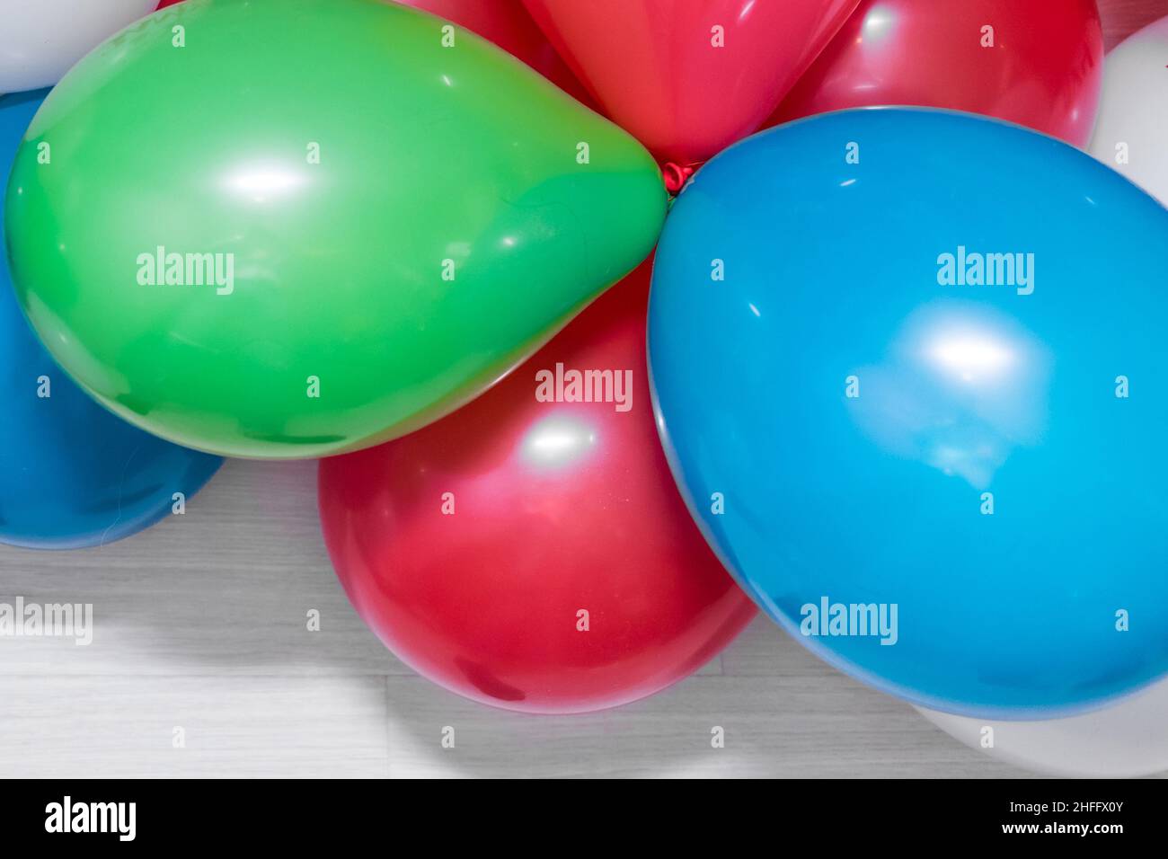Colorful Helium Balloons Birthday Party Decoration Background. Stock Photo