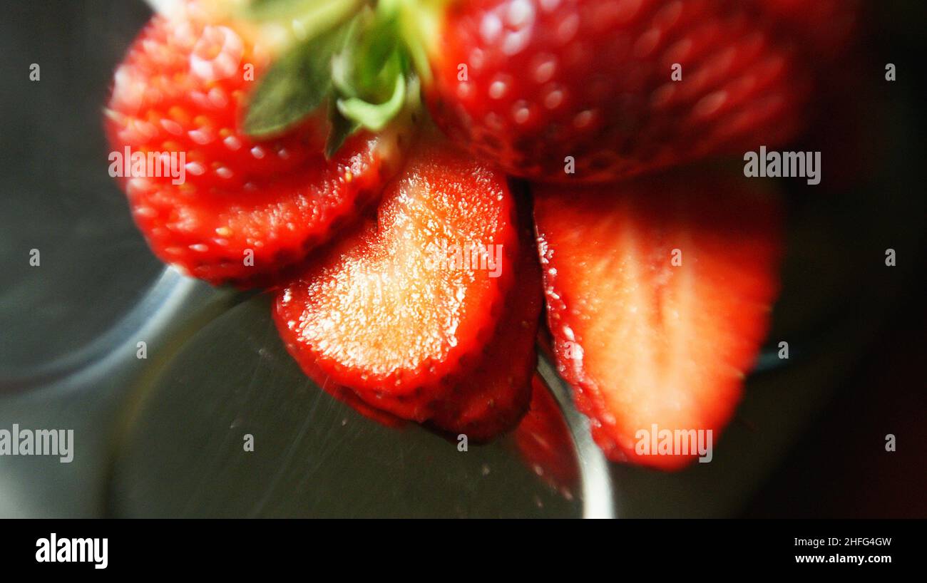 Strawberries in glass jar on white background Stock Photo Alamy