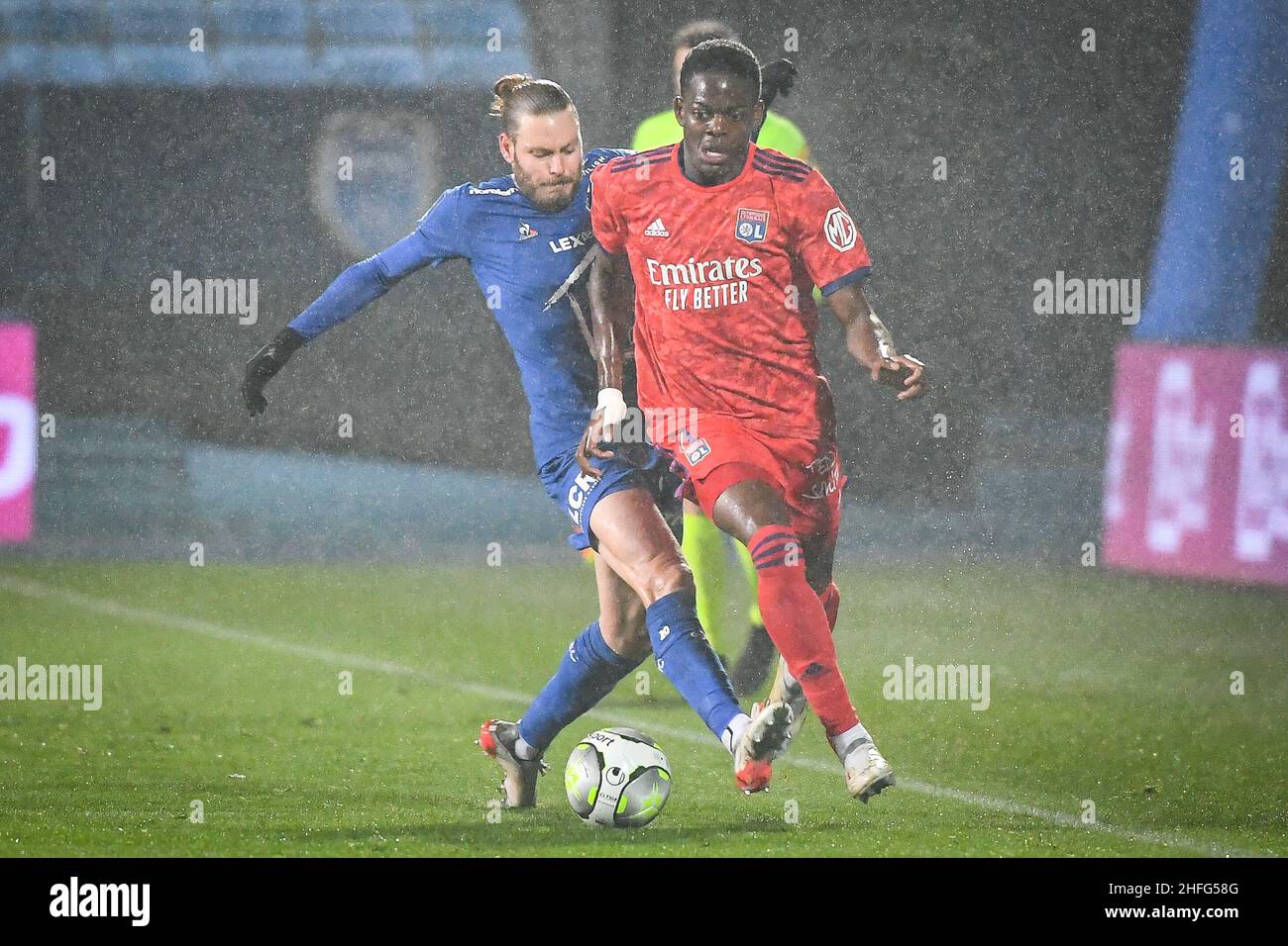 Troyes, France, France. 16th Jan, 2022. Renaud RIPART of ESTAC Troyes and  Castello LUKEBA of Lyon during the Ligue 1 match between ESTAC Troyes and  Olympique Lyonnais (OL) at Stade de l'Aube