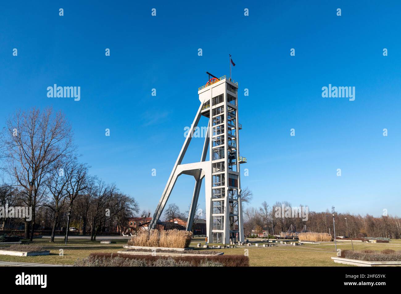 Chorzow, Silesia, Poland; January 9th, 2022: Mineshaft of a former Prezydent coal mine renovated and changed into a viewing platform in the local park Stock Photo
