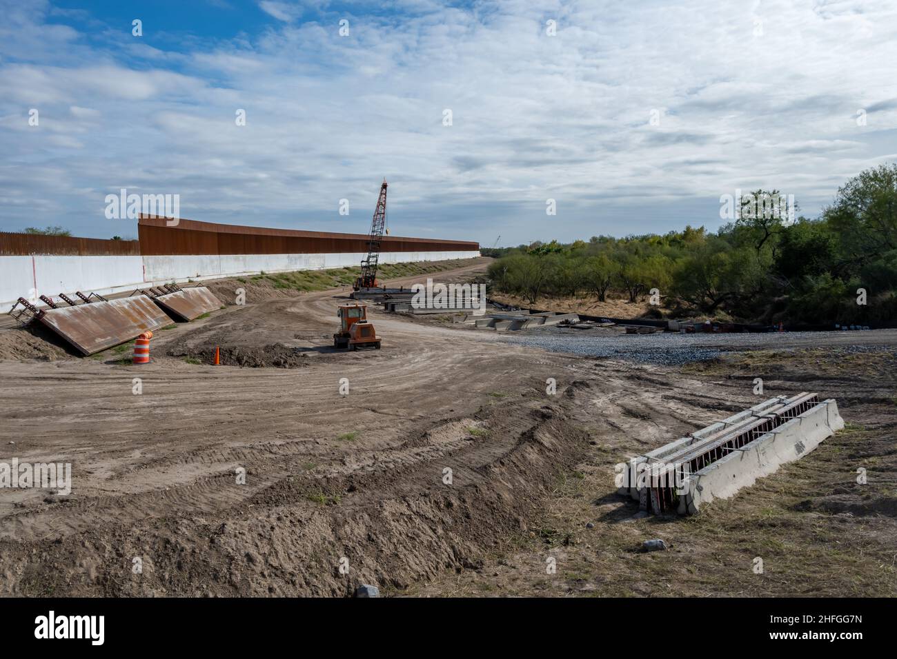 The US-Mexico border wall under construction. McAllen, Texas, USA. Stock Photo