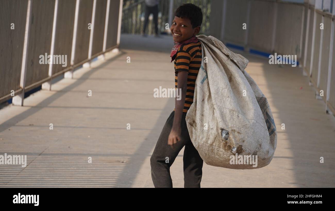 Peeragarhi, Delhi, INDIA - 13 NOVEMBER 2019: Unidentified bagger Kid at metro Stock Photo