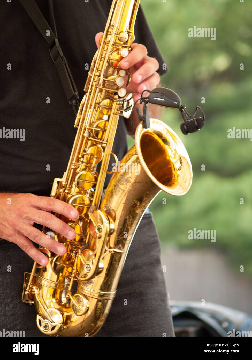 Jazz musician playing saxophone Stock Photo - Alamy