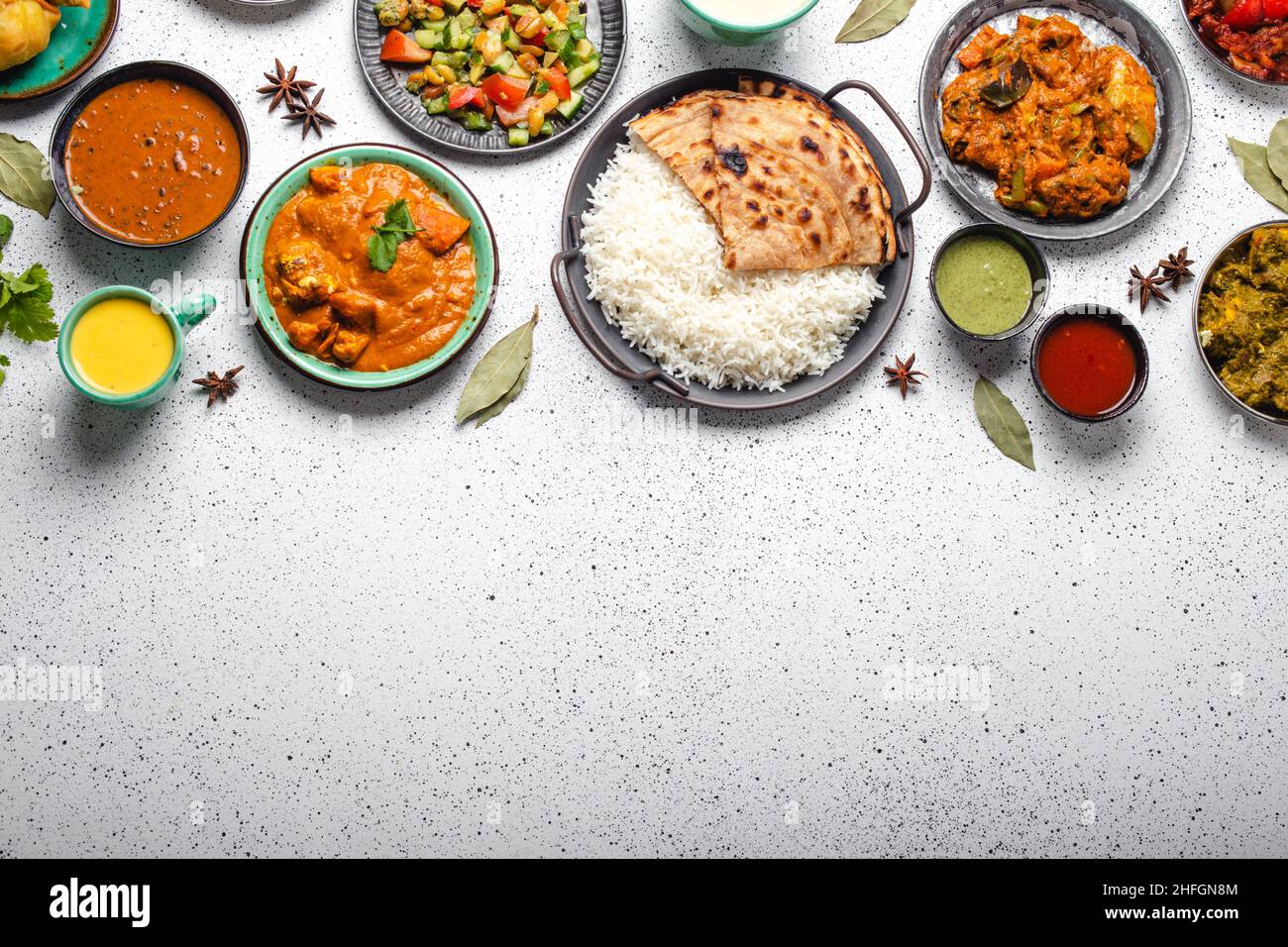 Indian ethnic food buffet on white concrete table top view copy space Stock Photo