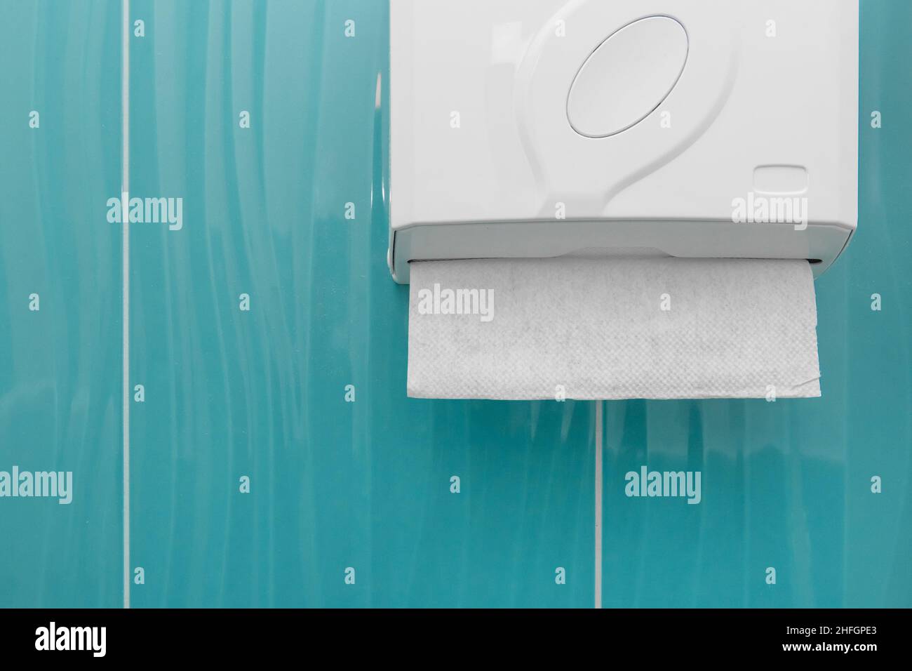 Paper Towel Dispenser Cleanliness and Hygiene Wipes in a Public Toilet or Bathroom Stock Photo