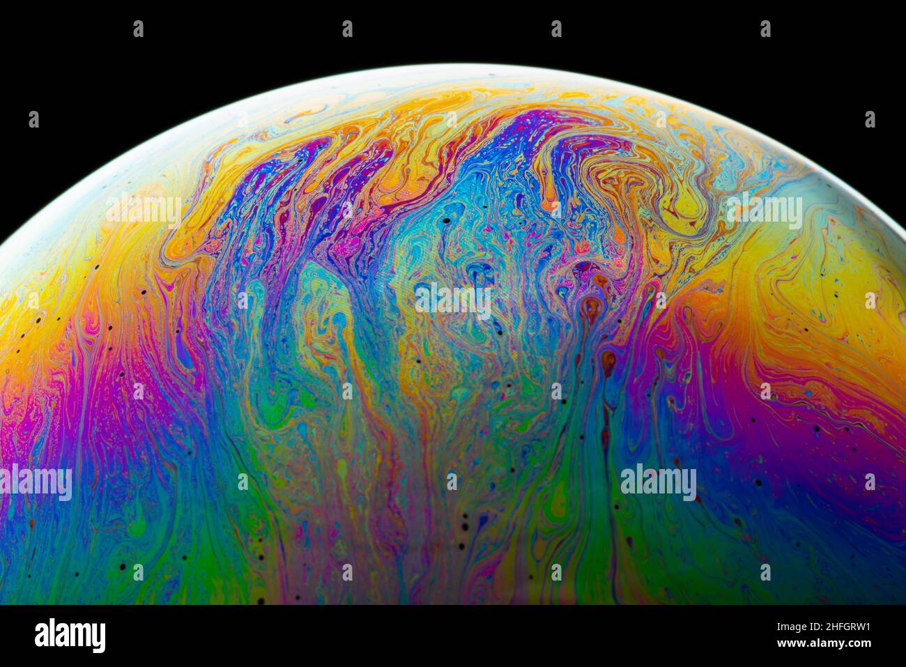 Multicolored abstract soap bubble close up macro Stock Photo