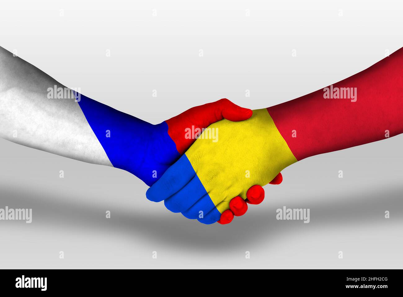 Handshake between romania and russia flags painted on hands ...