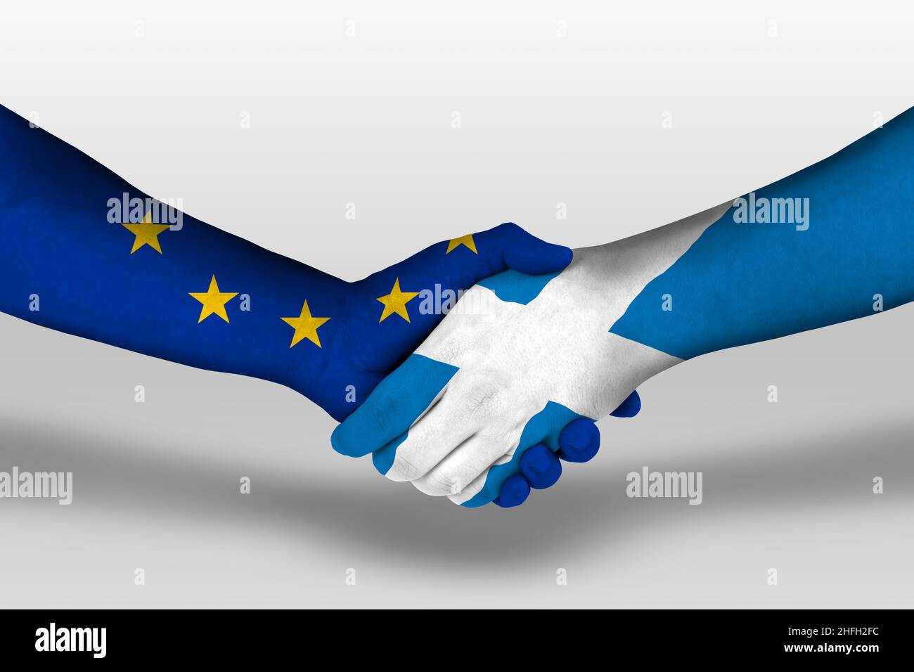 Handshake between scotland and european union flags painted on hands, illustration with clipping path. Stock Photo