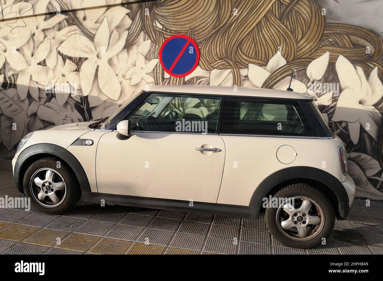 Car parked in front of a 'No Parking' sing in Malaga, Spain. Stock Photo